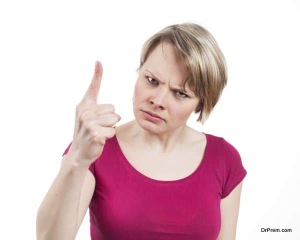 Young woman scolding somebody, isolated on white