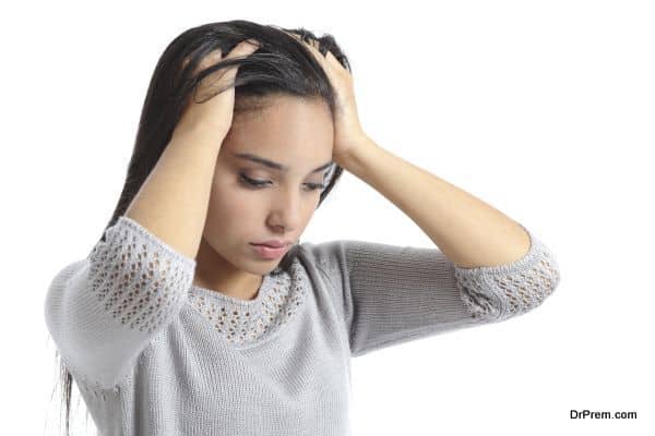 Arab woman worried with the hands in the head isolated on a white background