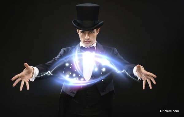 magician in top hat showing trick