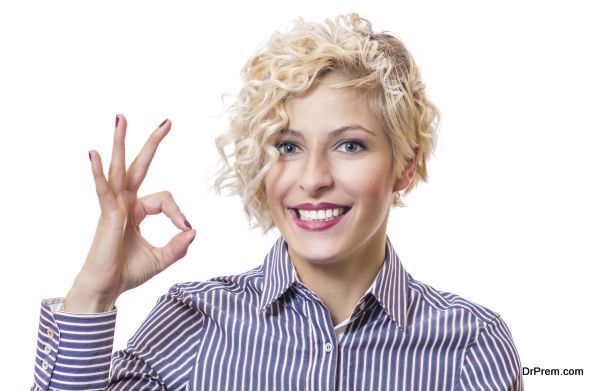 Happy smile woman gesturing ok - good, isolated on white background