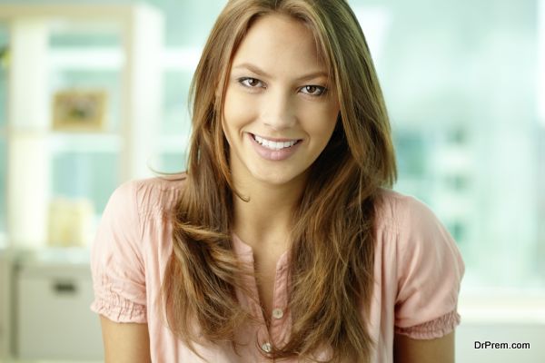 Portrait of a lovely brunette looking at camera and smiling