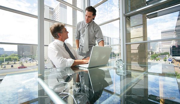 Businessmen using a laptop