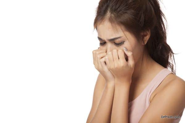 Pretty Asian girl crying  isolated on white background