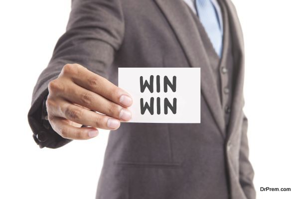 Businessman hand showing someone his business card with"WIN WIN" message
