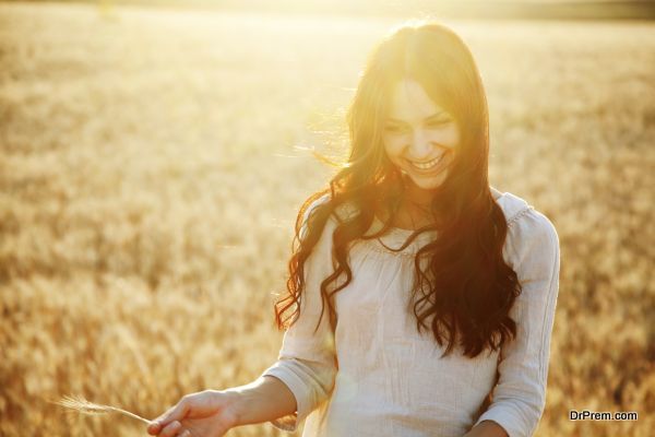 Beautiful lady in wheat field