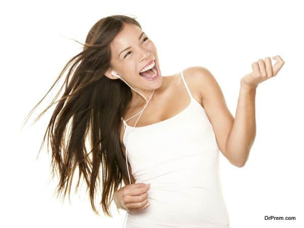 Woman listening dancing to music