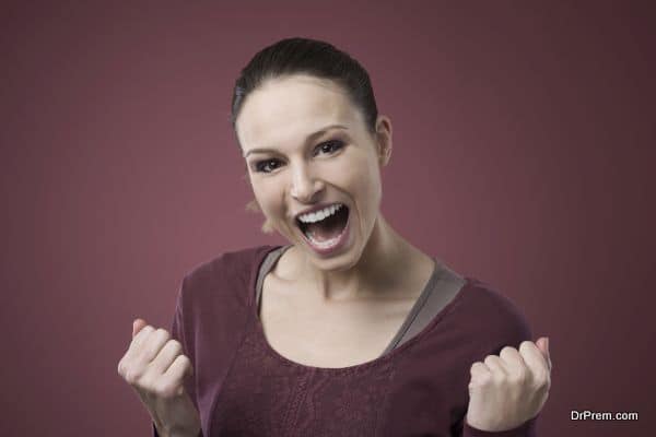 Cheerful winning woman