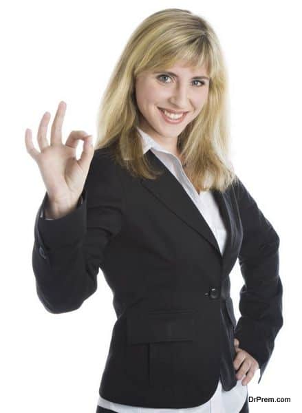 Young smiling woman in a business suit