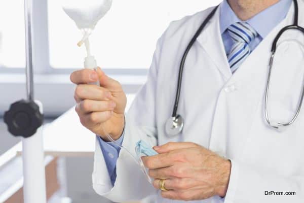 Doctor examining IV drip