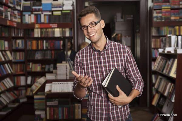 young caucasian guy in bookstore