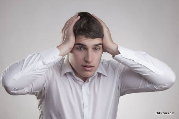 young man looks thoughtfully