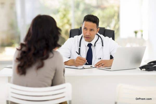 professional medical doctor consulting patient in office