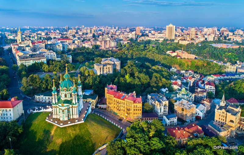 Aerial view of Saint Andrews church and Andriyivskyy Descent, cityscape of Podil. Kiev, the capital of Ukraine