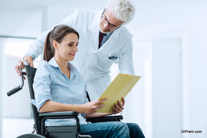 Doctor and patient examining a file with medical records