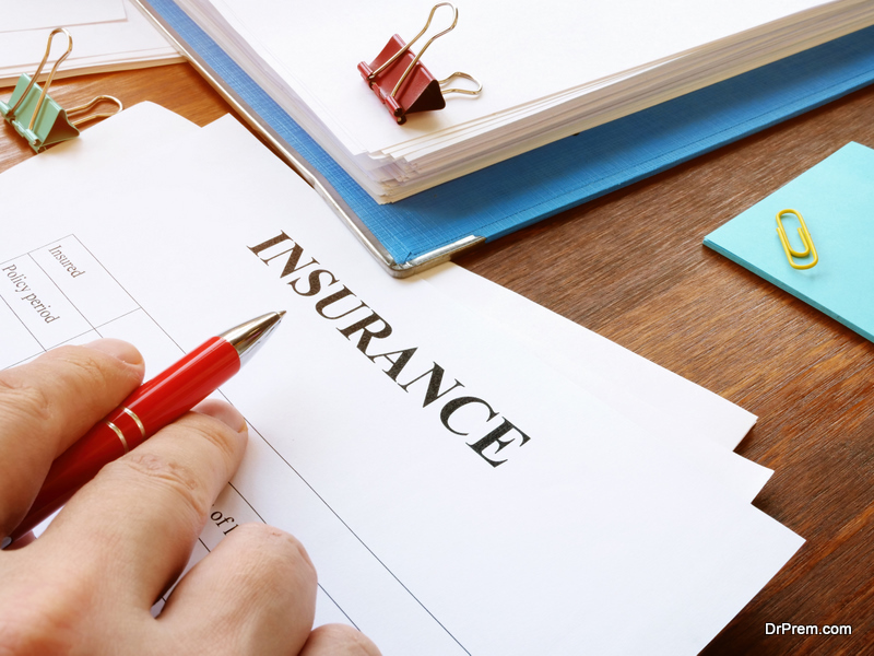 Man reads insurance form for signing