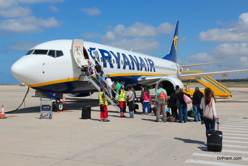 Passengers board Ryanair Boeing 737-800 aircraft in Paphos