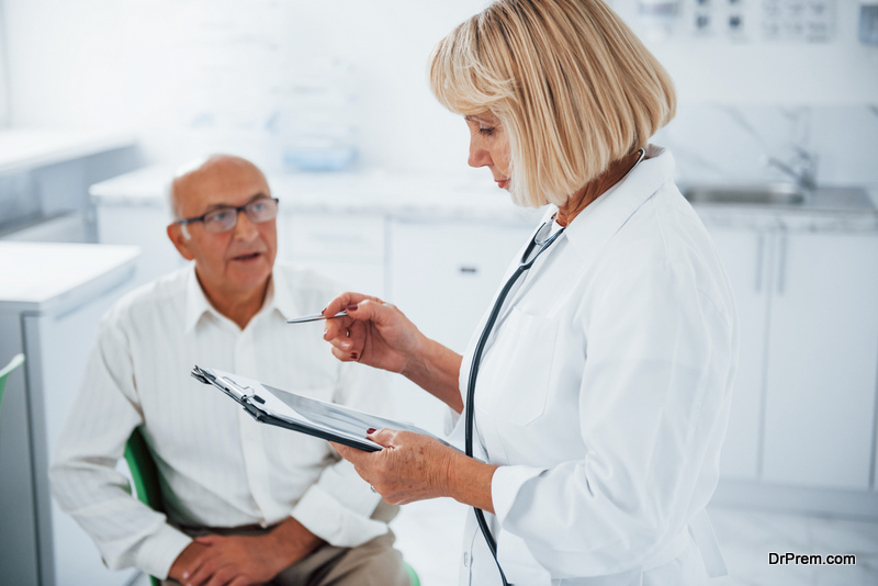 Senior man have consultation in the clinic by the female doctor