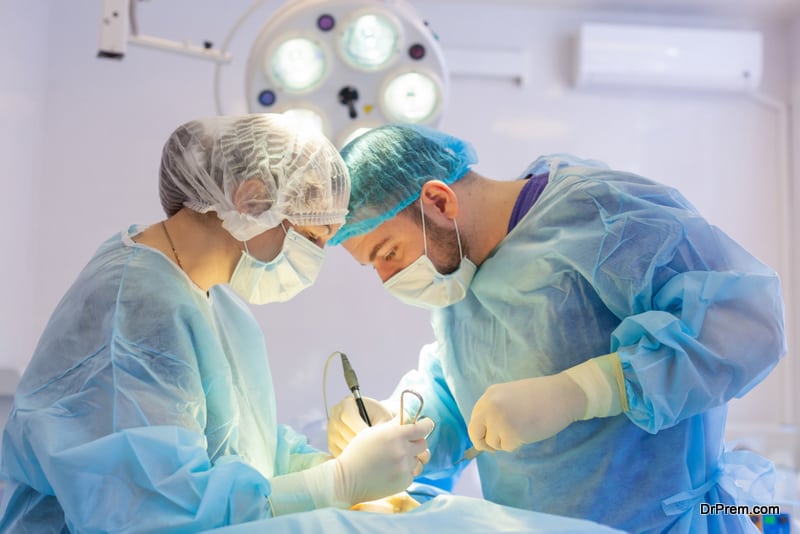 Surgeon operates in the operating room. Surgeons save life to the injured