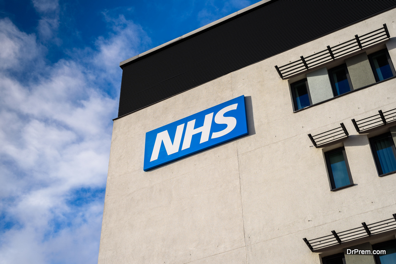 View of the NHS (National Health Service) logo at the Springfields Medical Centre in the centre of Warrington, Cheshire.