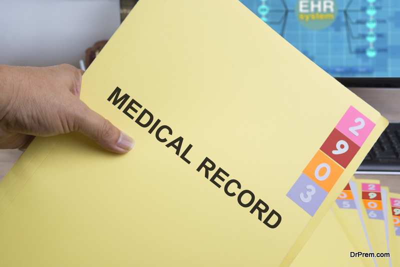 Yellow medical record folder in someone hand