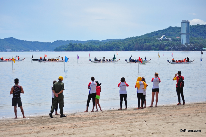 dragon boats racing during Sabah Dragon Boat Race in Kota Kinabalu, Sabah, Malaysia