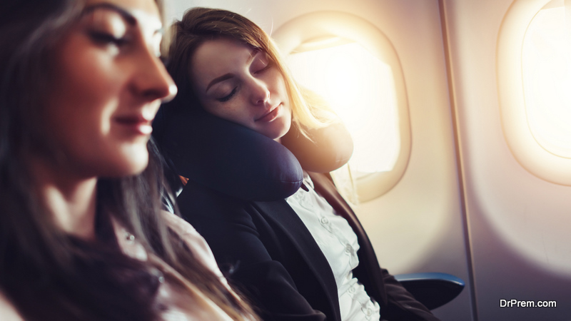 women travelling by aeroplane