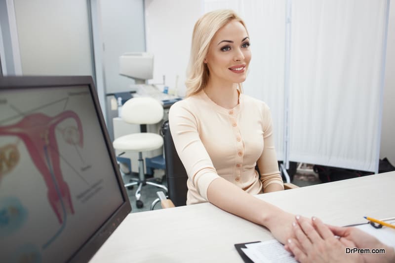 Attractive young woman is consulting with her gynecologist