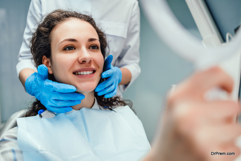  Happy patient and dentist 