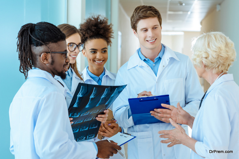 Medical interns listening to teacher