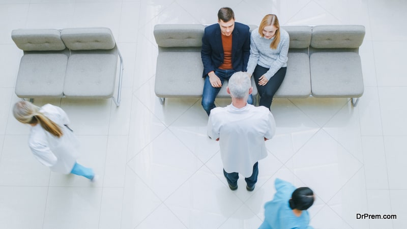 Young-Couple-Sitting-in-the-Lobby-Waiting-for-Treatment