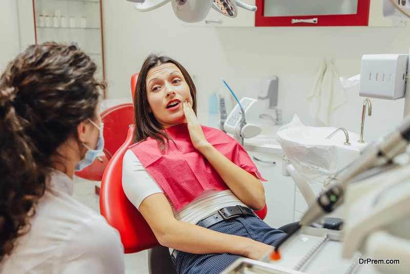 sad young girl with a painful tooth