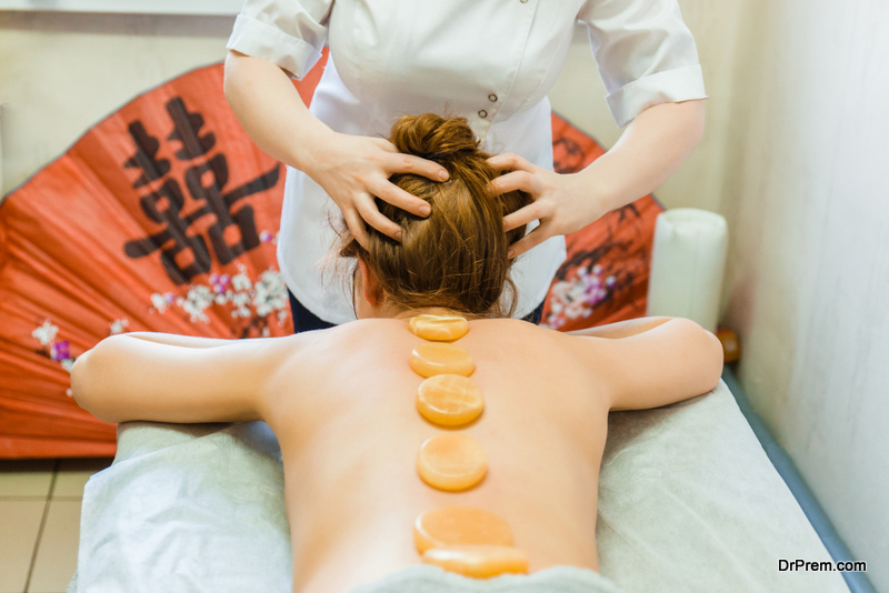 A-woman-enjoys-a-relaxing-back-massage-at-the-beauty-Spa