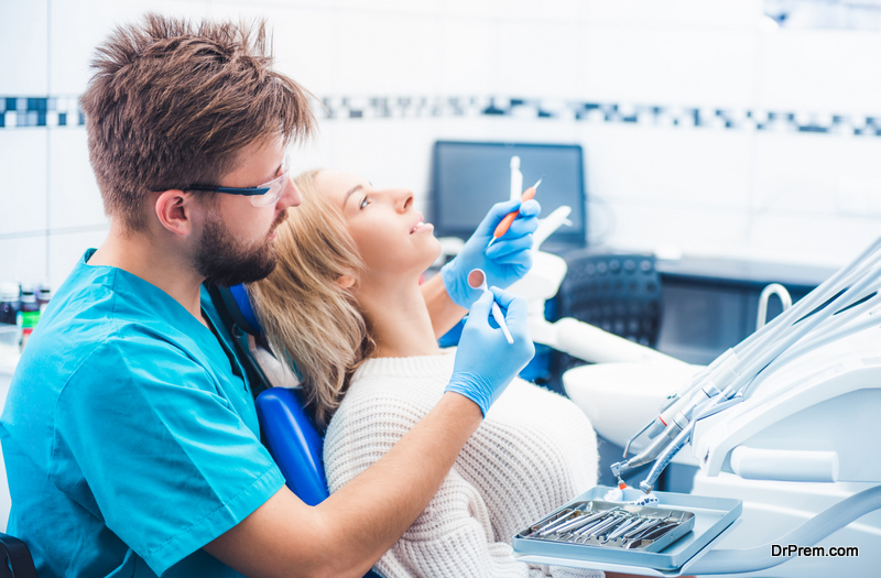 Patient and dentist in the dental office