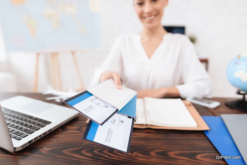 The travel agent keeps tickets for the plane in the travel agency