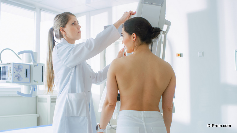 In the Hospital, Female Patients Undergoes Mammogram Screening Procedure Done by Mammography Technologist. Modern Technologically Advanced Clinic with Professional Doctors. Breast Cancer Prevention Screening.