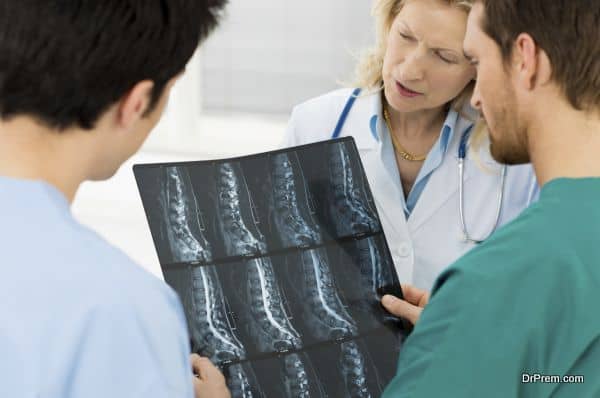 Doctors Examining X-ray Report