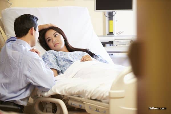 Husband Visiting Wife In Hospital