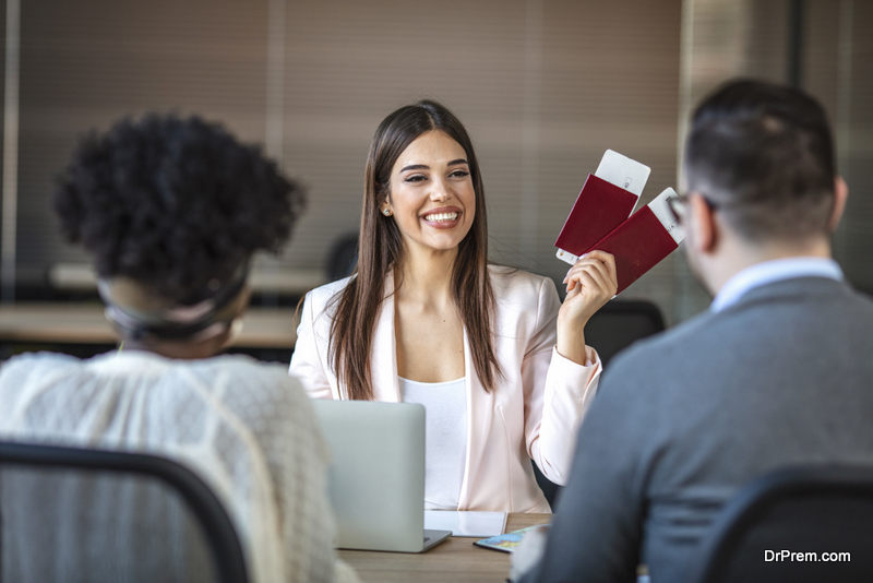 travel-agent-discussing-with-clients