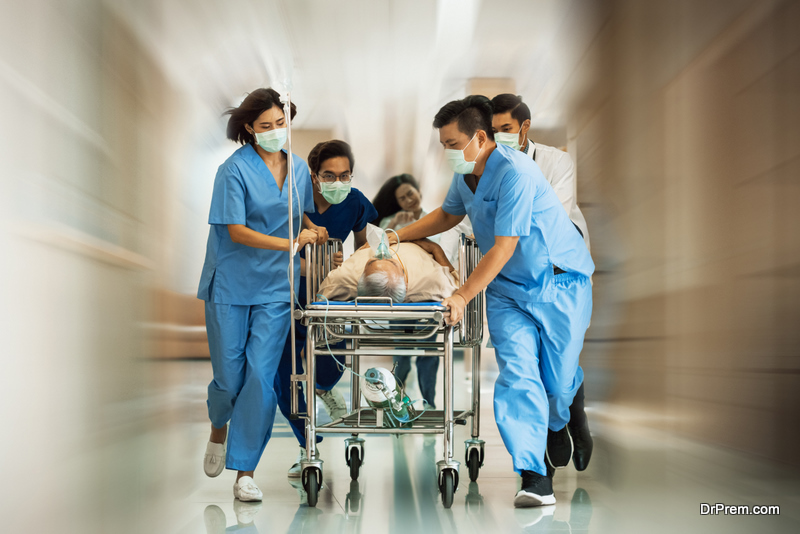 Emergency Department Group of Doctors with Seriously trauma Patient towards the Operating Room