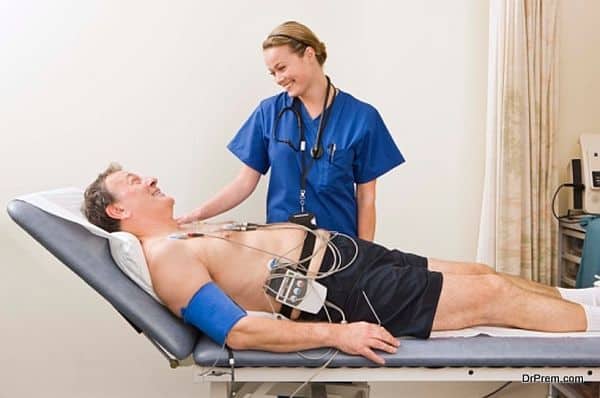 Technician with patient on a heart monitor