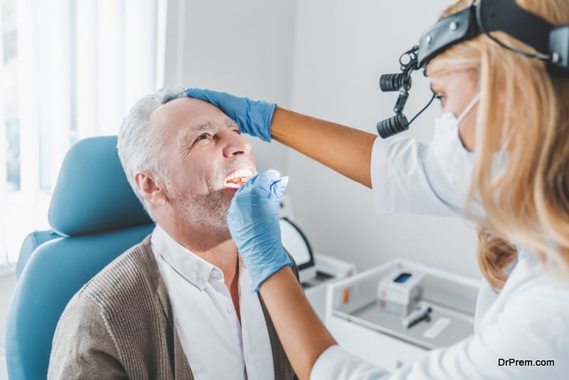 senior male appointment with dentist