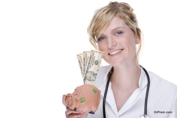 Doctor with piggybank (dollar)