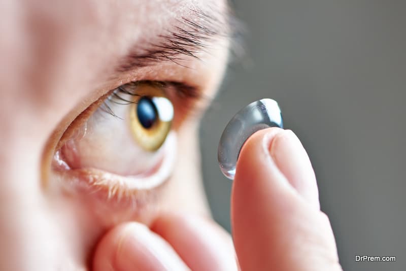 woman using special designed overnight contact lens