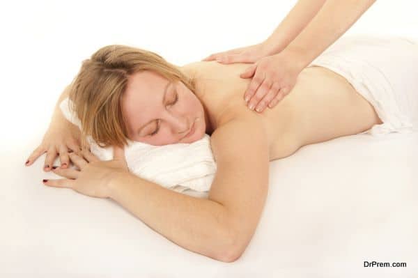 Natural young woman receiving a massage