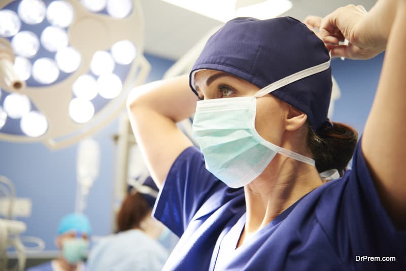 Side view of young female surgeon 