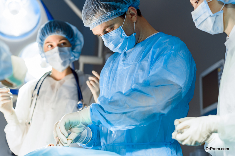 surgeons performing complex surgery