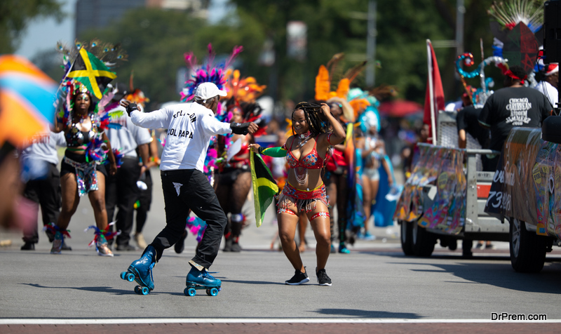 Women wearing traditional clothing from Jamica dancing at the parade