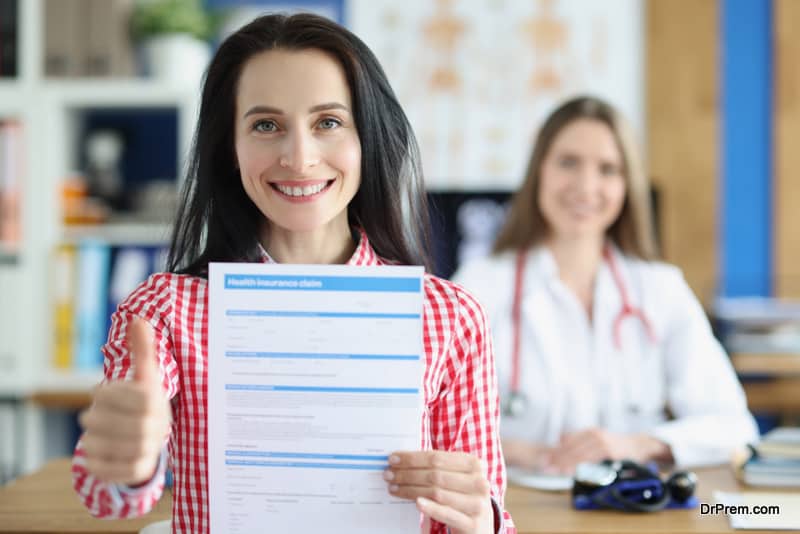 Insurance form for health in female patient in clinic