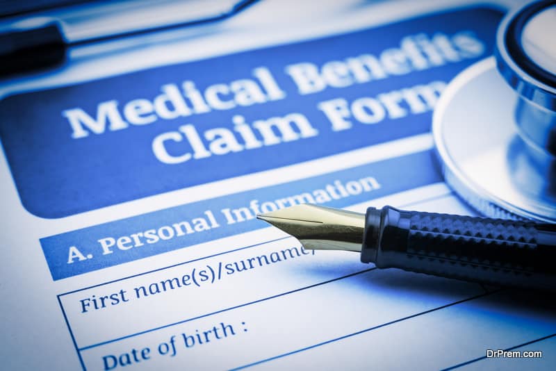 medical benefits claim form on a clipboard