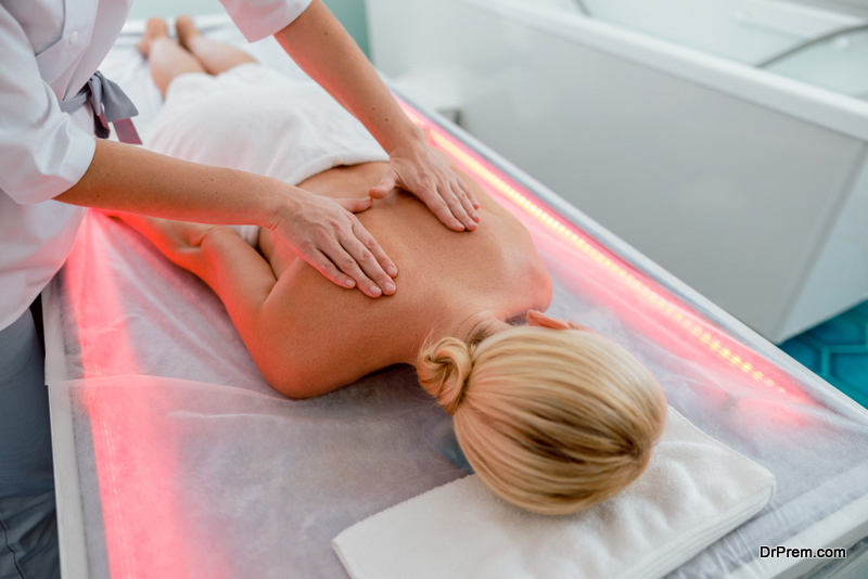 Top view of lady having massage on her shoulder 